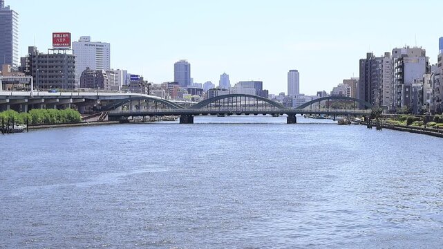 View landscape building office tower architecture cityscape of Taito city with traffic road bridge crossing sumida river for japanese people travelers visit at Asakusa on July 21, 2025 in Tokyo, Japan