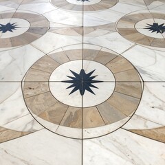 Intricate marble floor design with geometric patterns