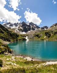 Alpine lake nestled in mountains (1)