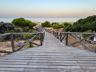 Obraz premium sand dunes that give access to La Barrosa beach in Sancti Petri, Cadiz, Spain