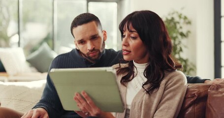 Conversation, planning and tablet with couple on sofa in living room of home for online booking. App, search and talking with people in apartment together, reading hospitality review on social media - Powered by Adobe