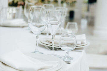 Elegant table setting with glassware in a bright venue