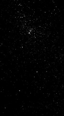 Obraz premium A celestial view of stars scattered across a black night sky, creating a sense of depth and vastness in the infinite universe