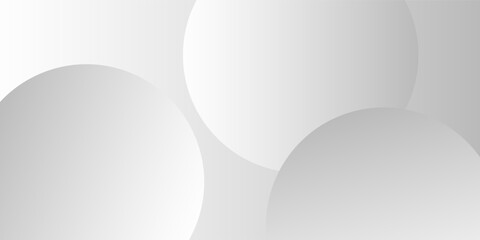 A minimalist abstract background featuring overlapping curves and circular shapes in various shades of gray, creating a smooth gradient and subtle depth