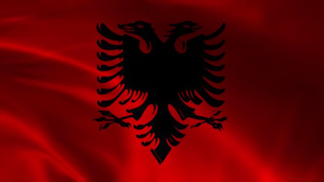 Vibrant crimson textile adorned with a powerful two-headed avian emblem, symbolizing national pride and heritage for a sovereign European nation, depicting a rich cultural identity