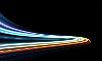 Abstract light trails curving across a dark background