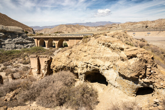 bridge of the N-340a road on a dry landscape of Sierra Alhamilla next to Tabernas, Almeria, Andalusia, Spain