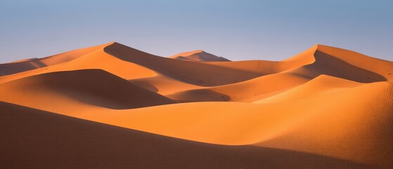 The mesmerizing beauty of vast golden sand dunes at sunset.