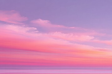Pastel sunset sky with clouds. Soft pink and purple hues fill the sky, with wispy clouds in various shades of pink and purple. The horizon is a pale, almost white color