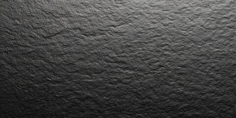 Dark gray textured surface resembling stone