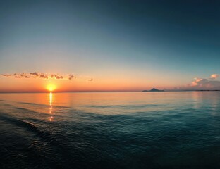 Panoramic sunrise over tranquil ocean
