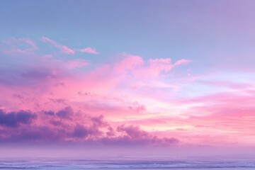 Pastel sunset sky over ocean