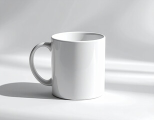 Obraz premium White ceramic mug isolated on white with soft shadow