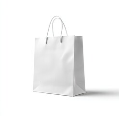 A pristine white paper shopping bag with slightly creased sides, featuring two thin, looped handles sits on a white background casting a subtle shadow
