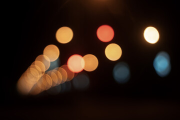 Multicolored red lights close-up on dark background