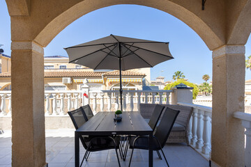 Covered Terrace with Outdoor Umbrella