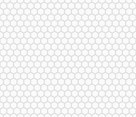 Honeycomb hexagons background. Gray color on matching background. Hexagon mosaic pattern. Hexagon geometric shapes. Seamless pattern. Tileable vector illustration.