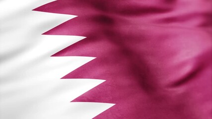 Qatar flag waving with maroon and white serrated design, symbolizing unity and Gulf Arab heritage - Powered by Adobe