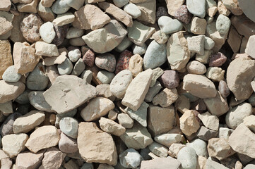 The photo shows a close-up of crushed stone