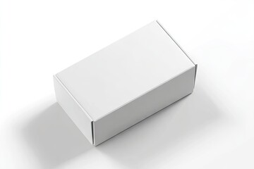 Fototapeta premium A simple, blank, white rectangular cardboard box sits on a white background, casting a subtle shadow