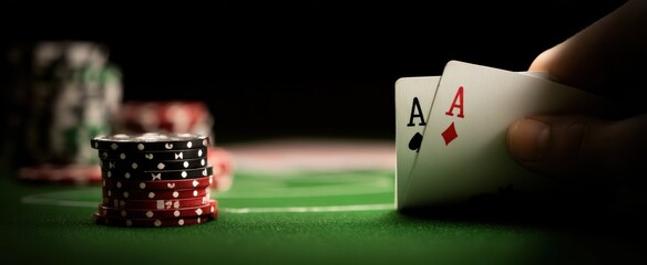The winning hand showing two aces in a thrilling poker game.