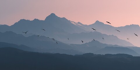 A majestic summer dawn over a mountain ridge, flock of birds in flight cutting across the glowing sky