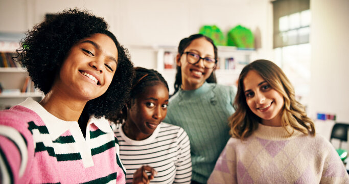 Selfie, students and smile with girls in classroom for social media post, study group and picture. Education, photography and high school memory with teenagers on campus for friends and support