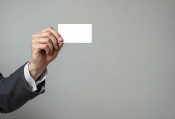 male arm in suit give blank calling card