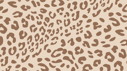 Brown and beige leopard skin texture. Animal print background. Luxury wallpaper. © Lara