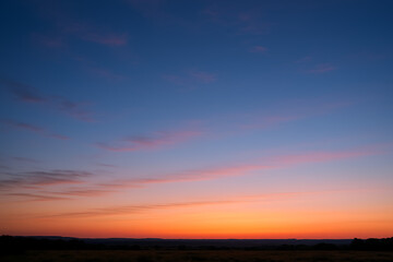 Fototapeta premium Beautiful sunset sky landscape background orange blue sky nature scenic view wallpaper photography