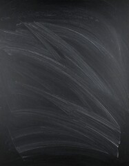 Chalk marks on a dark surface