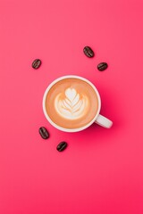 Coffee Cup on Pink Background with Beans Flat Lay 