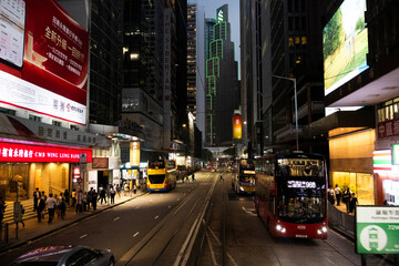 View landscape building skyscraper cityscape house of HongKong city and nightlife and lifestyle local chinese people walking on street night time at traffic road on April 26, 2025 in Hong Kong, China