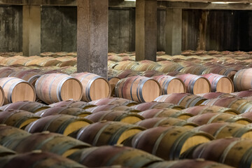 Obraz premium Oak barrels aging red wine in Rioja winecellars Spain winemaking process