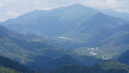 Naklejka premium The beautiful mountains view from the top of the hill in spring