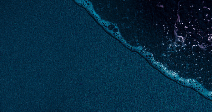 Dark beach, top view 