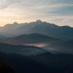 Soft Sunrise Glow over Vast Peaks