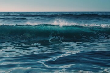 Fototapeta premium Ocean Waves Rolling in Deep Blue Sea Under Clear Sky