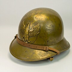 Vintage military helmet with eagle emblem on display