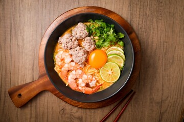 Homemade instant noodles soup with shrimps minced pork and eggs	
