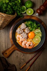 Homemade instant noodles soup with shrimps minced pork and eggs	