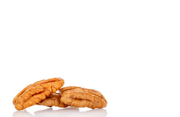 Peeled pecan nuts isolated on white background, close-up.