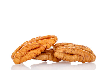 Peeled pecan nuts isolated on white background, close-up.