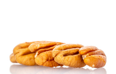 Peeled pecan nuts isolated on white background, close-up.