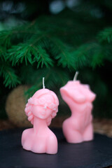 Handmade sculptural candles in pastel pink, shaped as female bust and torso. Unique soy wax decor for modern interiors, weddings, gifts and romantic decoration.