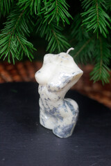 Handmade torso candle with marble-style texture and silver flakes. Decorative wax sculpture, unique home accessory and perfect gift idea.