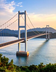 Obraz premium Modern suspension bridge over tranquil water