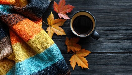 Cozy autumnal scene with coffee and leaves