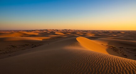 Rippled Sands and Rolling Dunes Under a Gradient Blue and Gold Sky