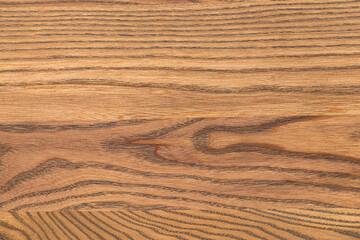 A close-up of a natural wood texture.